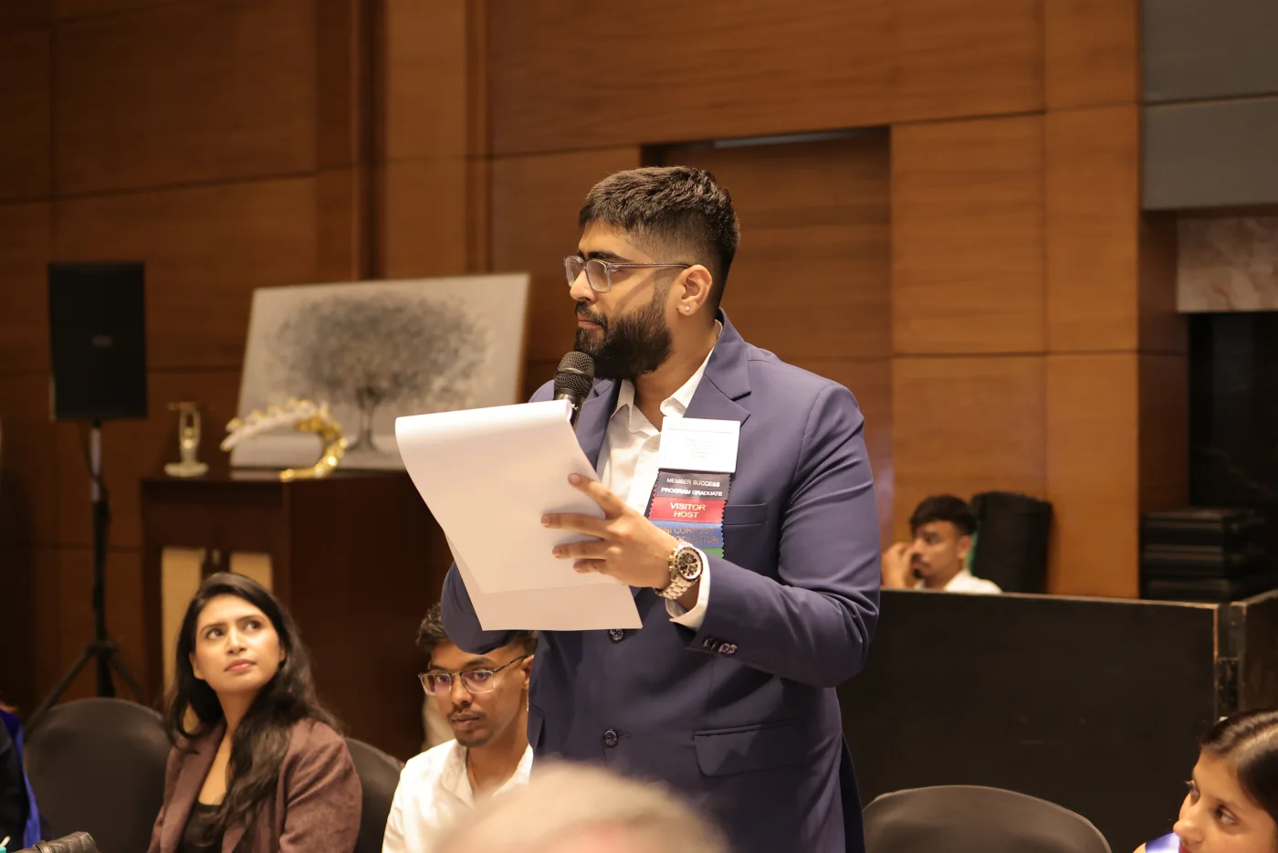 Chirant speaking at a professional gathering